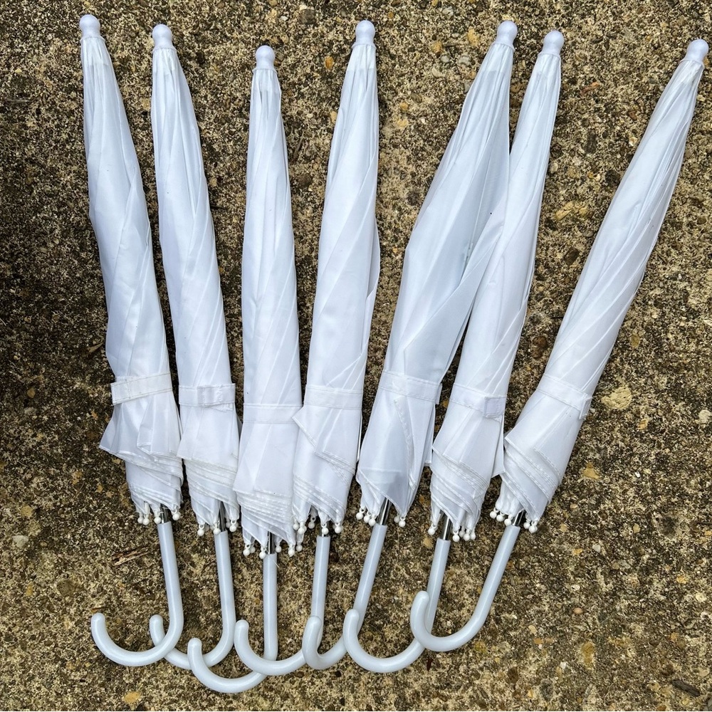7 White Umbrellas Perfect for Weddings.
